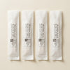 Four sealed Back2Sleep sachets in sizes S, M, L, XL on cream paper